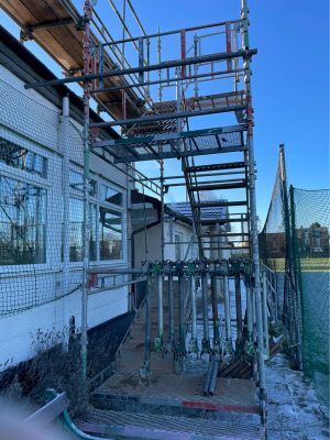 Scaffolding and solar installation work on the roof at Kidderminster Cricket Club