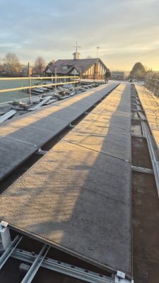 Close-up of AIKO solar panels installed on the roof at Kidderminster Cricket Club