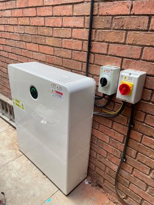 GoodWe 6kW inverter and AC isolator switches mounted on the external wall of a Worcestershire home
