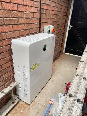 16.6kWh GoodWe battery storage unit installed against the outside wall of a family home